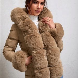 Tan belted puffer coat with faux fur trim.